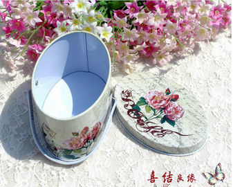 中国 115 * 55 * 120mm Nestle の印刷/浮彫りになることを用いる卵形のコーヒー錫箱 サプライヤー